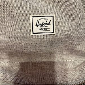 Light grey herschel book bag in great condition